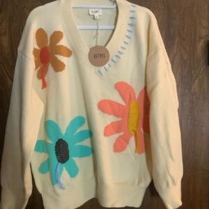 BiBi Cream V-Neck Sweater with Colorful Floral Appliqués